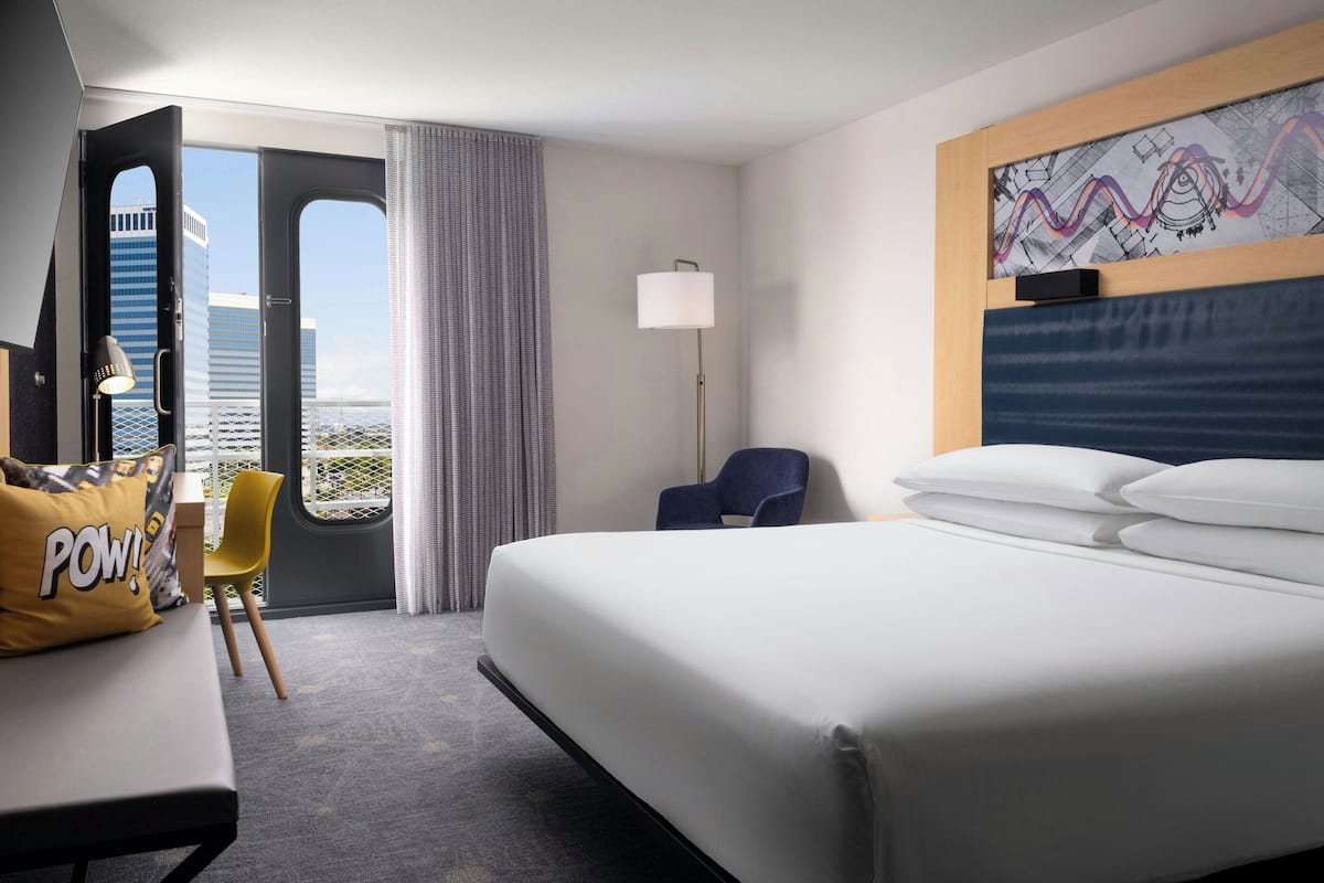 premium bedding, desk, laptop workspace, blackout curtains