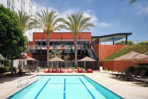 Outdoor pool, open 7:00 AM to 10:00 PM, pool umbrellas, pool loungers