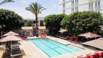 Outdoor pool, open 7:00 AM to 10:00 PM, pool umbrellas, pool loungers