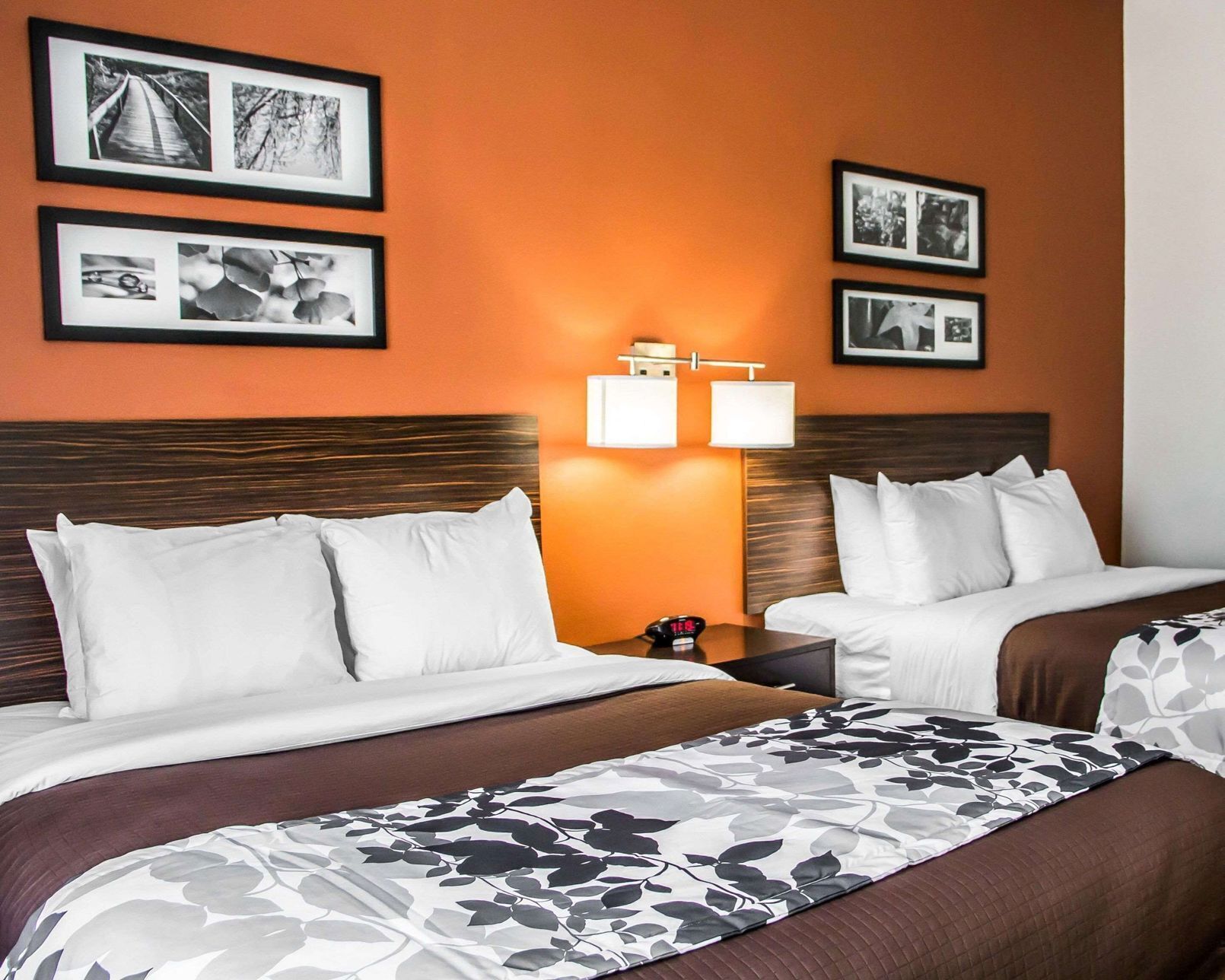 Premium bedding, pillow-top beds, desk, laptop workspace