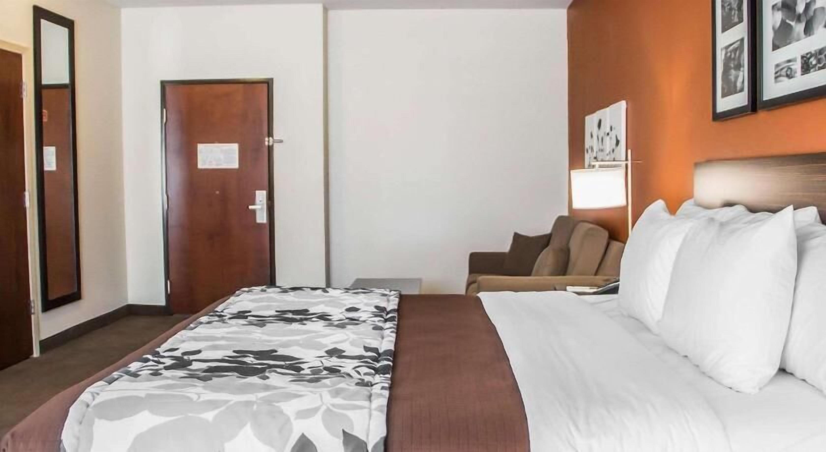 Premium bedding, pillow-top beds, desk, laptop workspace