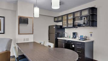 Suite, 1 Bedroom (1 King Bed, Sofa Bed) | 1 bedroom, individually furnished, desk, laptop workspace