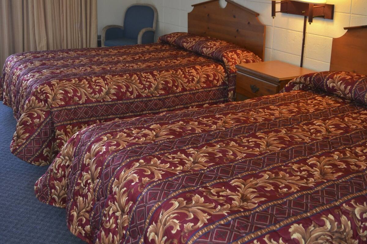 Blackout drapes, WiFi (free), bed sheets