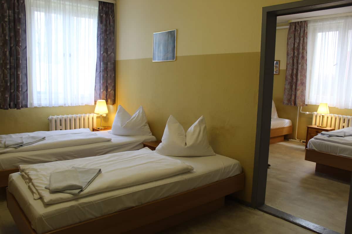 Quadruple Room, Multiple Beds, Shared Bathroom | Free WiFi, bed sheets