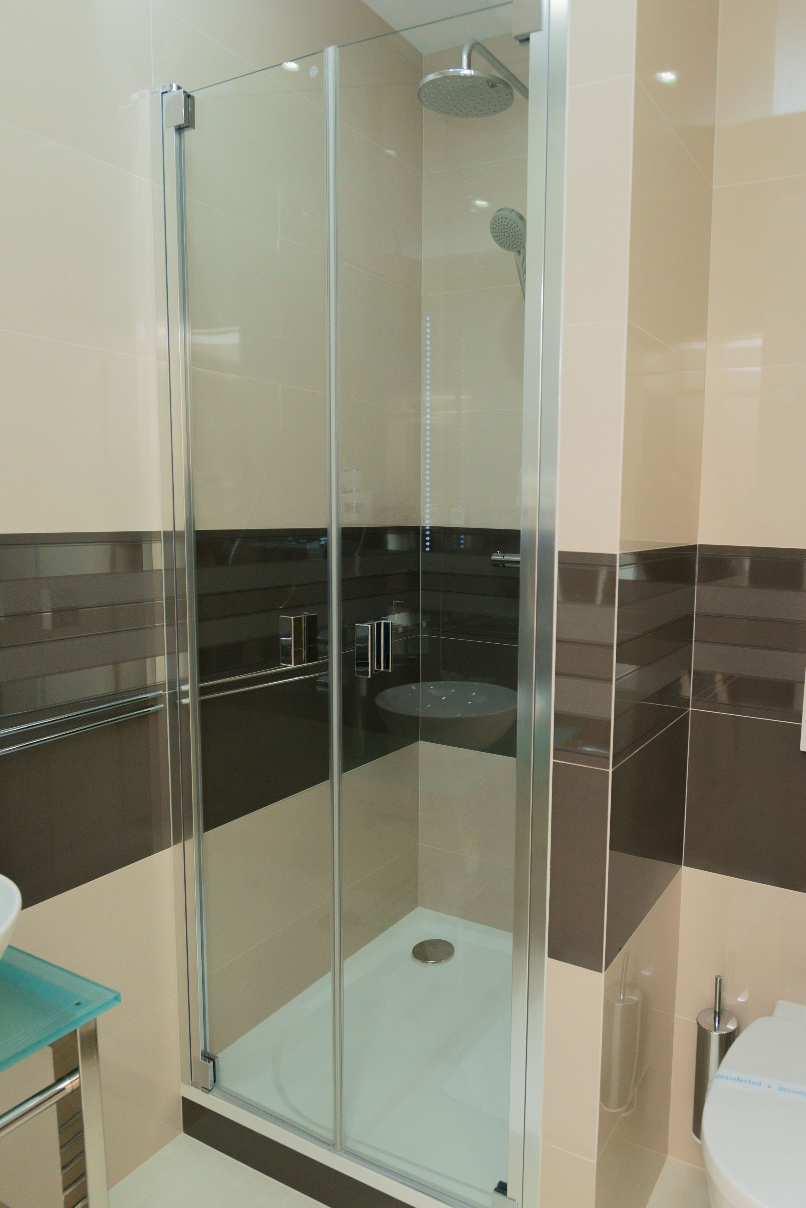 designer toiletries, hair dryer, bathrobes, slippers