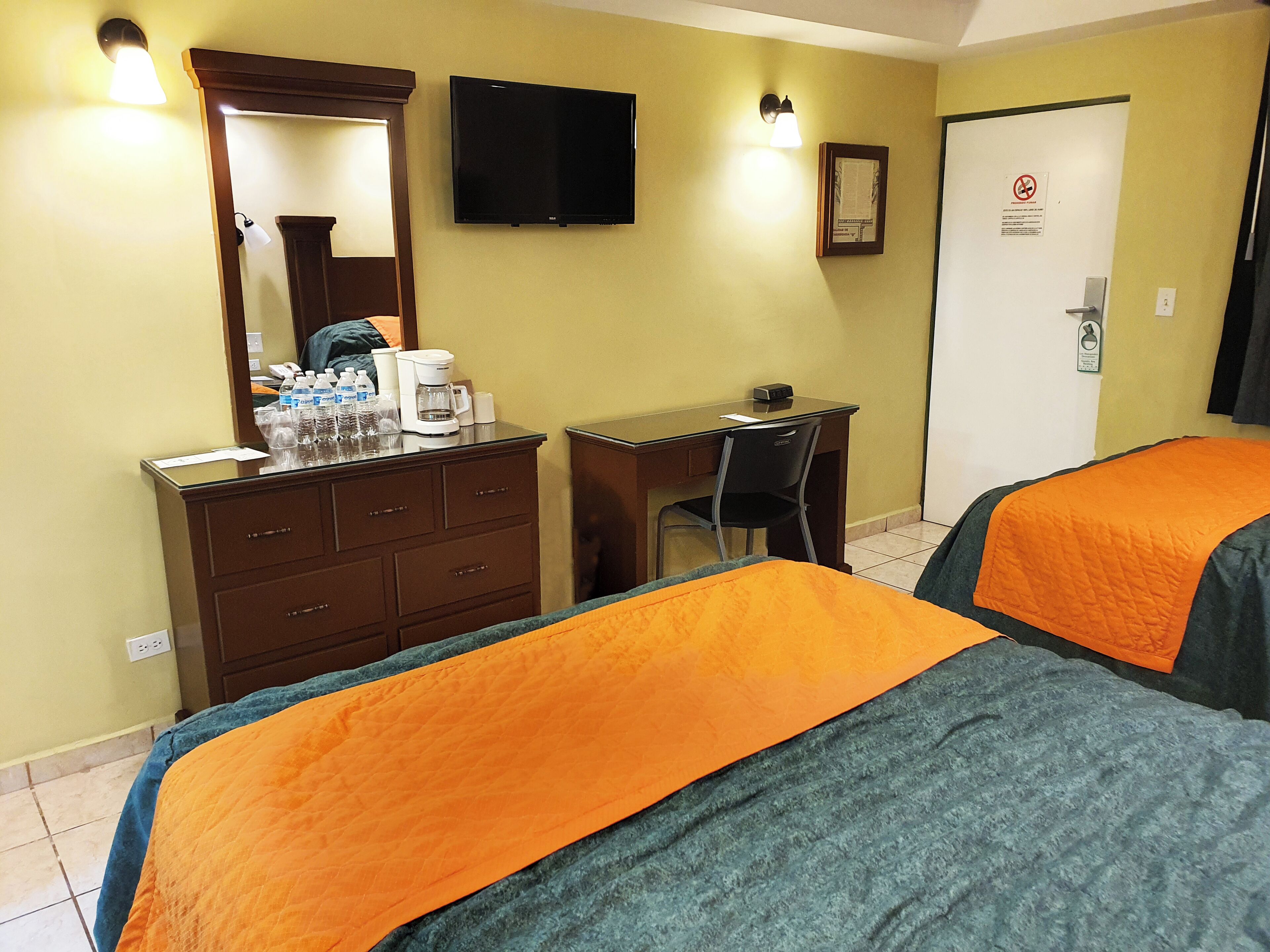 comfort room, 2 double beds | in-room safe, desk, laptop workspace, free wifi