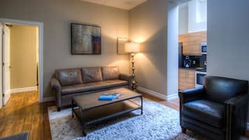 Deluxe Suite, 1 Queen Bed | Living area | Flat-screen TV, Netflix, streaming services