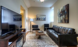 Penthouse Suite, 2 Bedrooms | Living area | Flat-screen TV, Netflix, streaming services - Western Hotel & Executive Suites (Guelph)