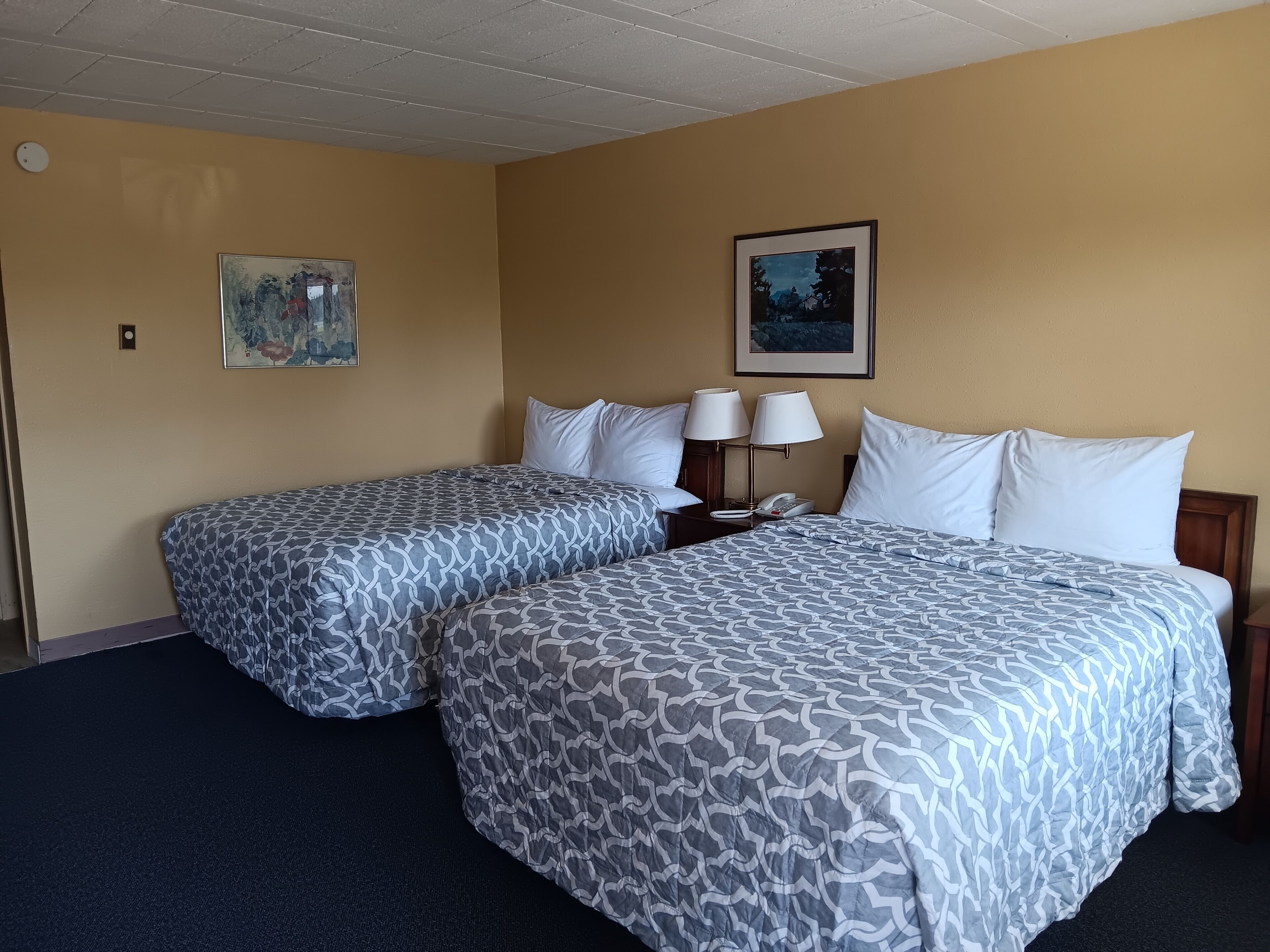 Standard Double Room Single Use, 2 Queen Beds | Rollaway beds, free WiFi, bed sheets