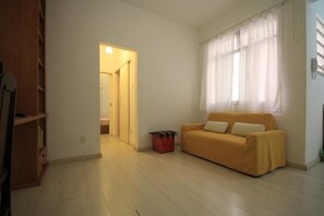 Apartment, 1 Bedroom | Living area | Flat-screen TV