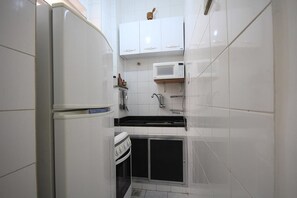 Apartment, 1 Bedroom | Private kitchen | Fridge, microwave, stovetop, coffee/tea maker