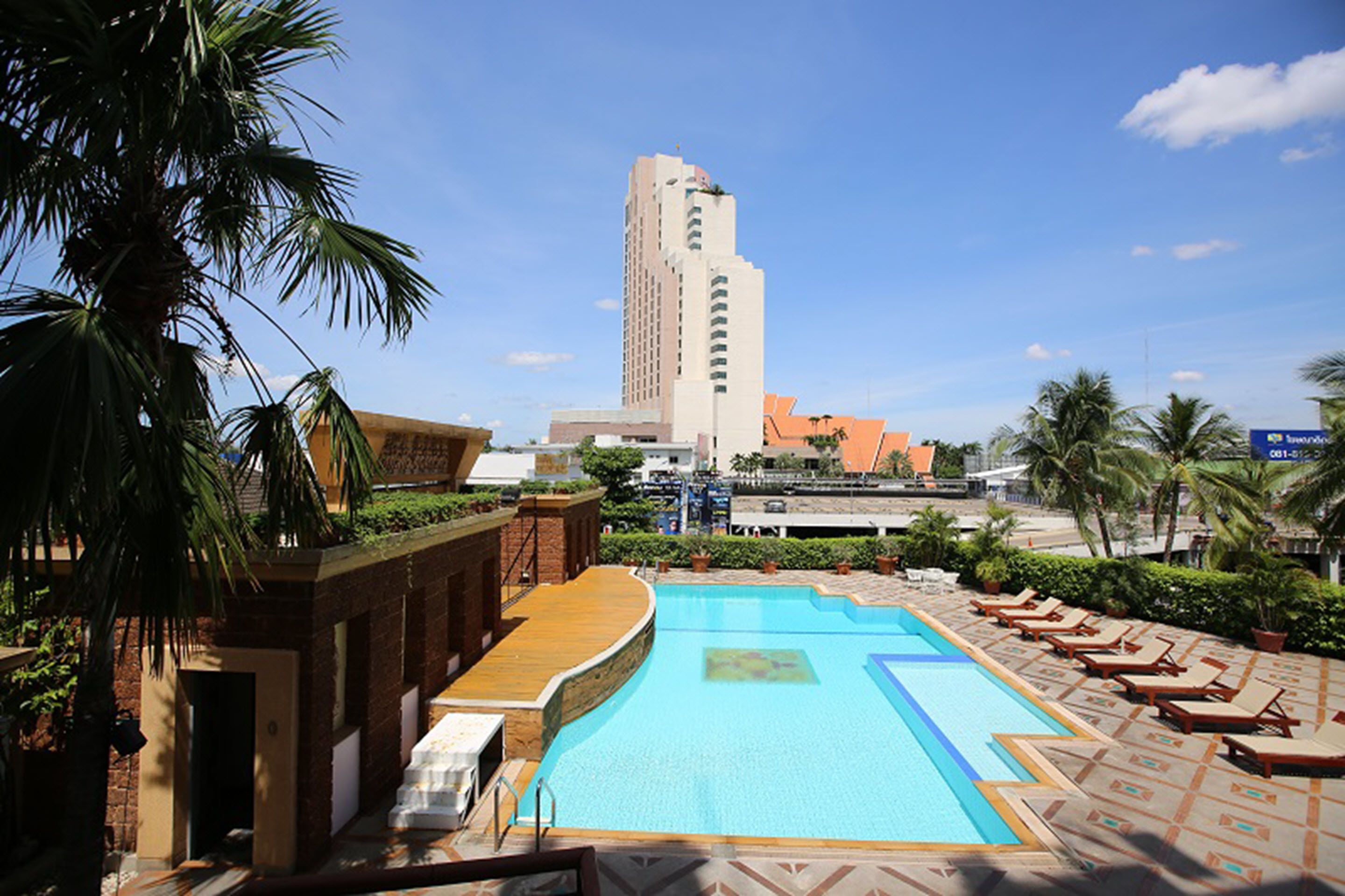 outdoor pool, pool umbrellas, pool loungers