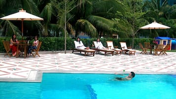 Outdoor pool, pool umbrellas, sun loungers