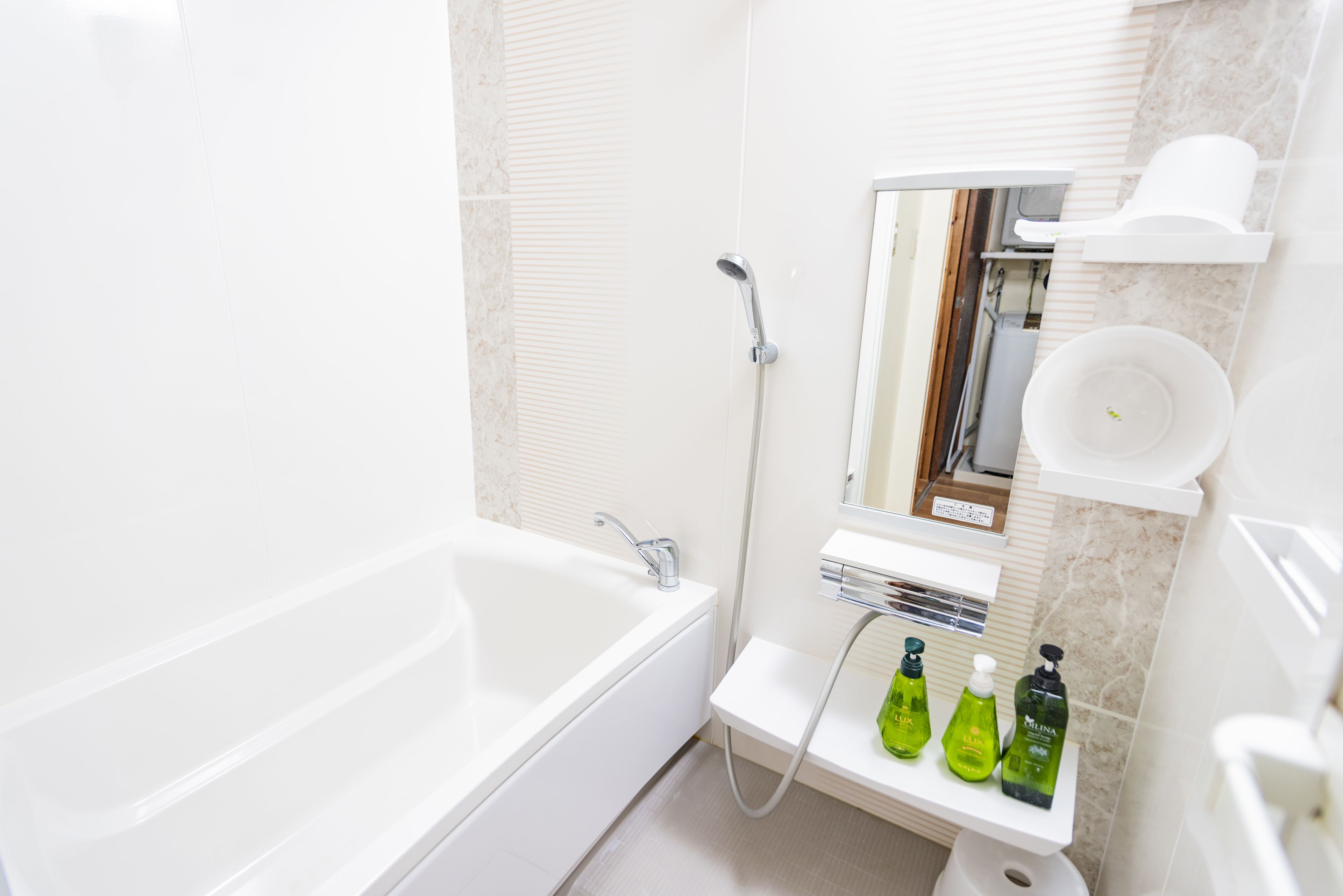 Shower, free toiletries, hair dryer, slippers