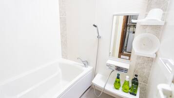 Shower, free toiletries, hair dryer, slippers
