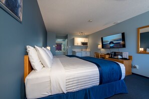 Deluxe Room, Multiple Beds, Kitchenette | Desk, laptop workspace, blackout drapes, iron/ironing board
