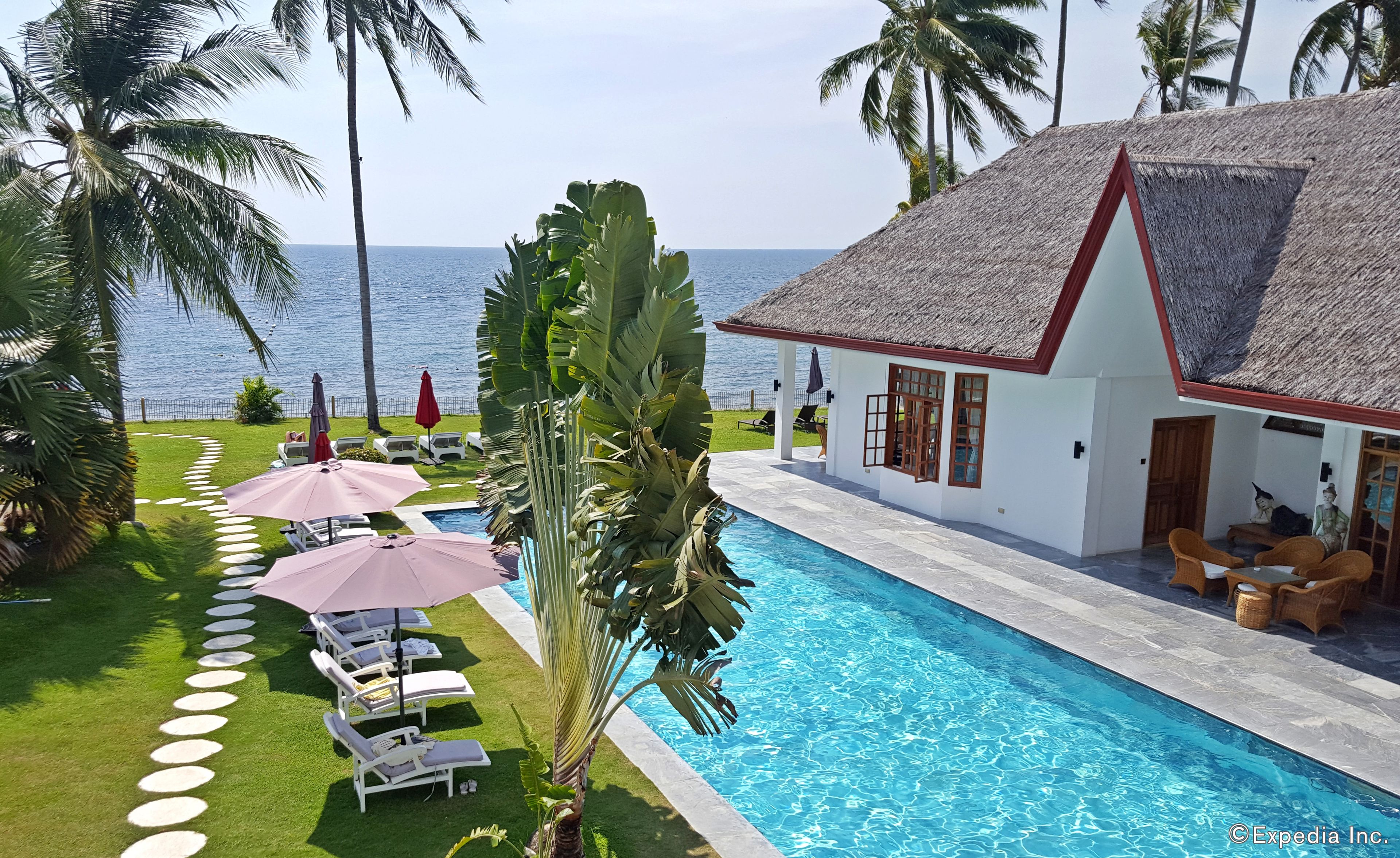 Outdoor pool, pool umbrellas, sun loungers