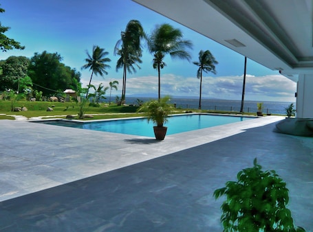 Outdoor pool, pool umbrellas, sun loungers