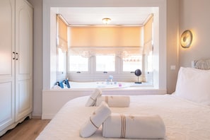 Ropa de cama de alta calidad y minibar
