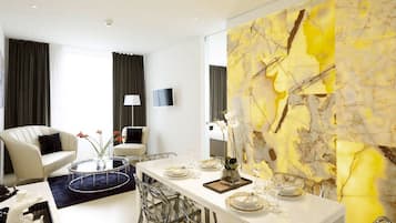 32-inch flat-screen TV with cable channels, TV