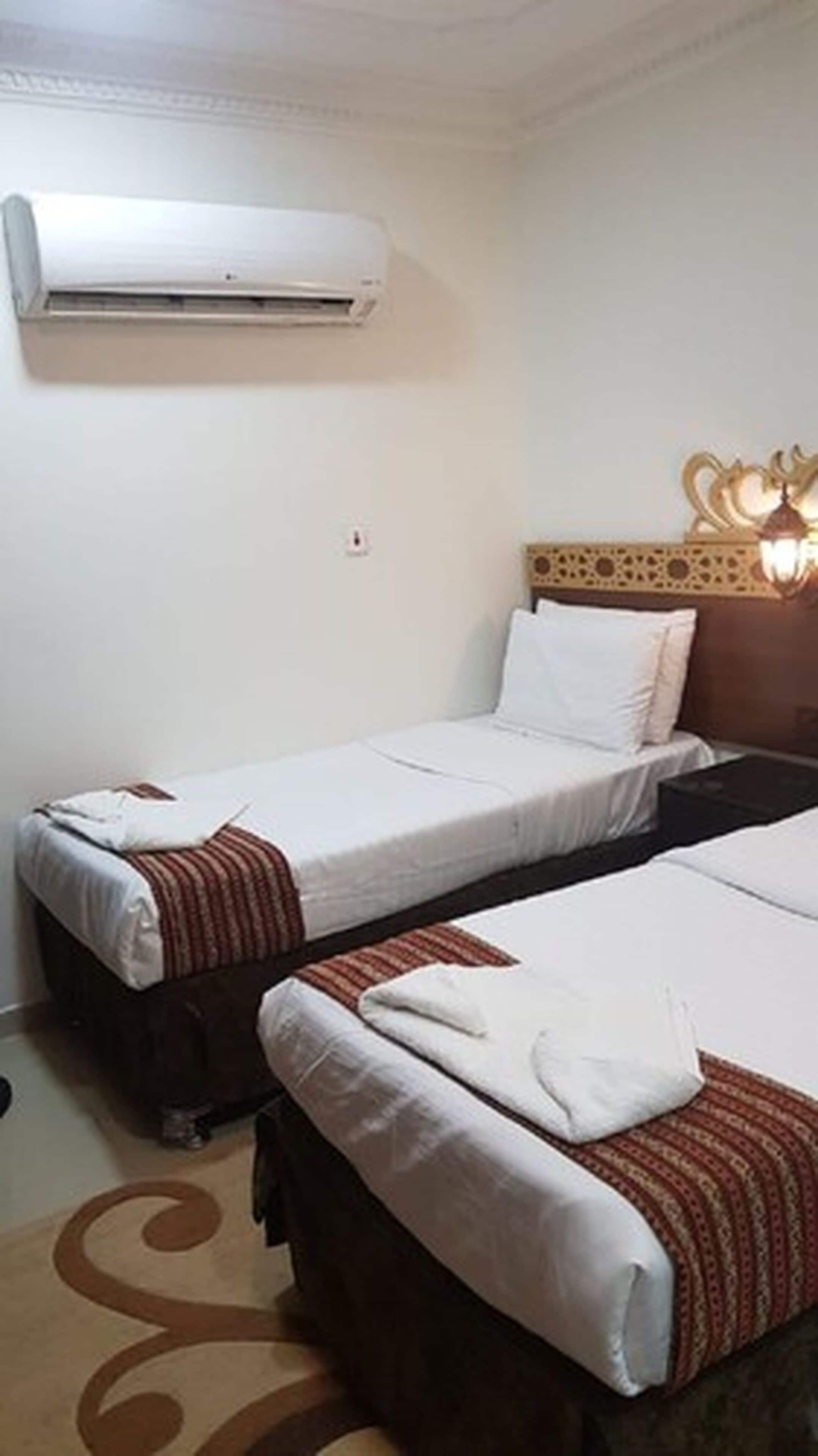 Lakens van Egyptisch katoen, luxe beddengoed, een kluis op de kamer