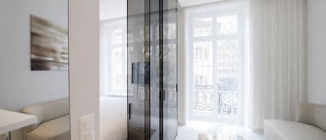 One Bedroom Junior, Balcony, Kitchenette | Living area | Flat-screen TV