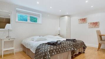 Twin Room, Shared Bathroom | Desk, laptop workspace, blackout drapes, iron/ironing board