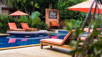 2 outdoor pools, open 8:30 AM to 6:00 PM, pool loungers