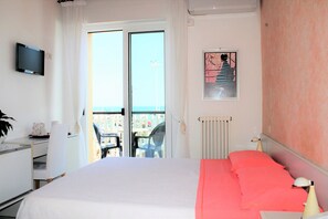 Panoramic Double Room, 1 Bedroom, Balcony, Sea View | Minibar, individually decorated, desk, blackout curtains