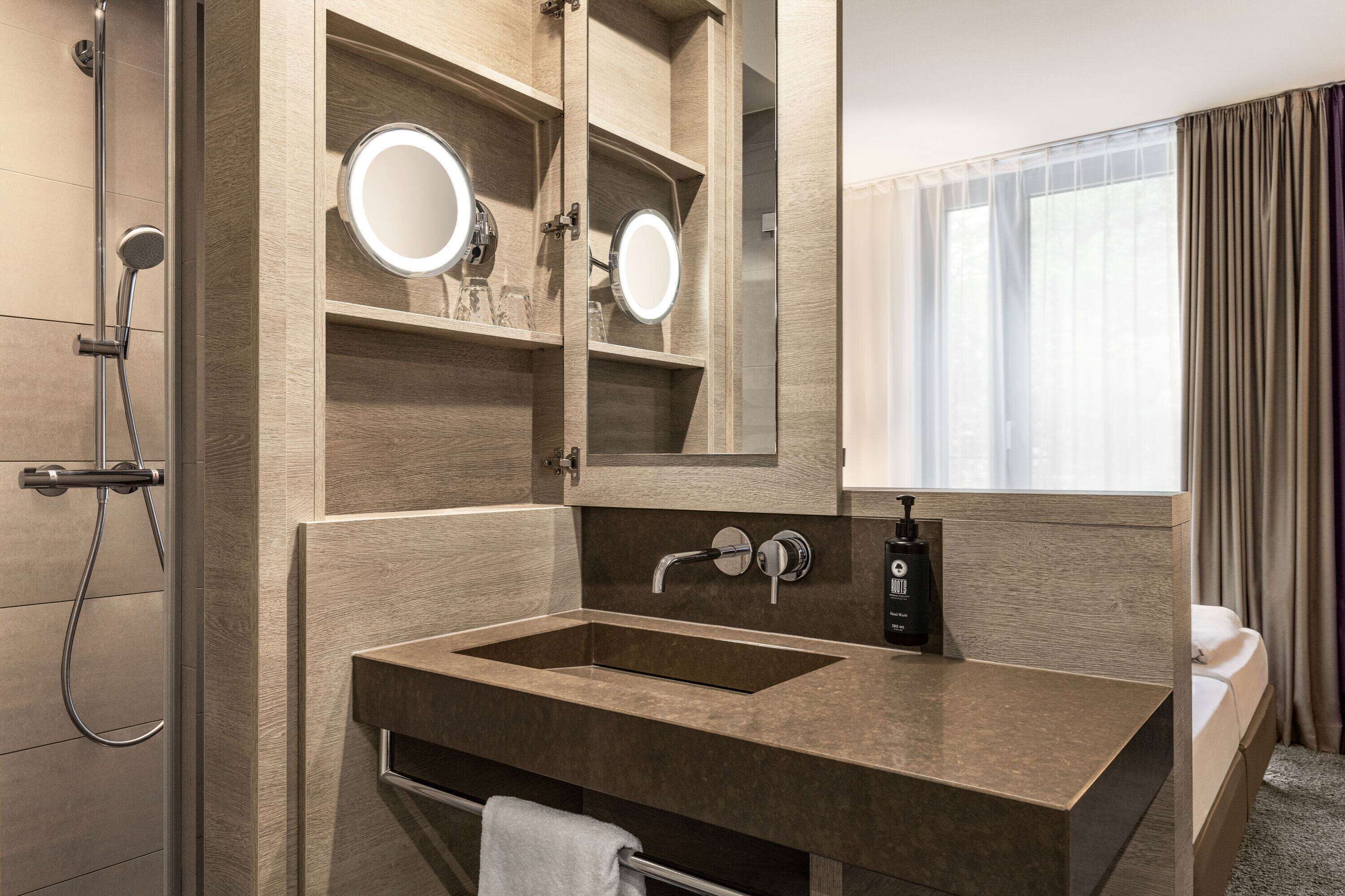 eco-friendly toiletries, hair dryer, towels