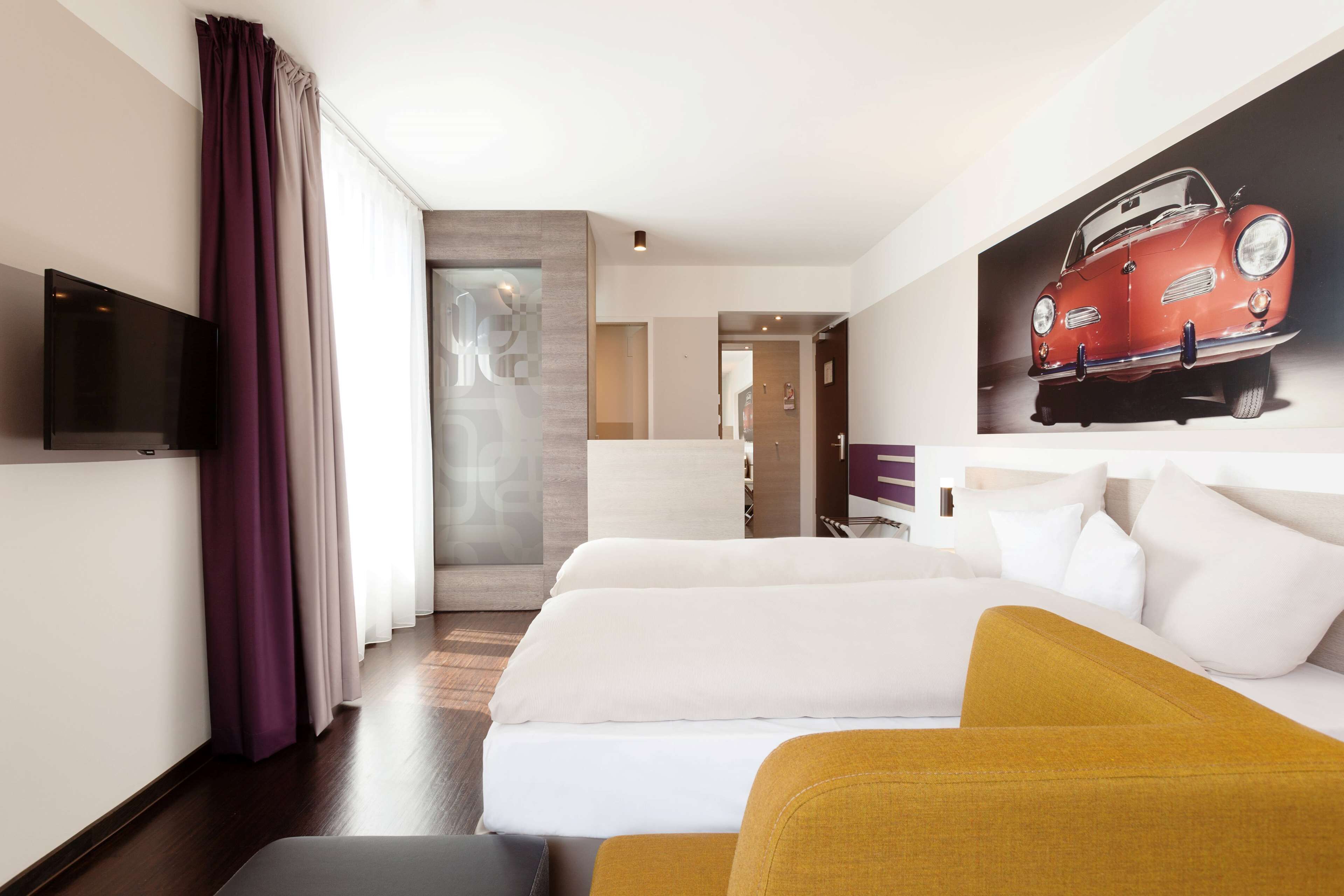 comfort twin room | in-room safe, desk, laptop workspace, soundproofing