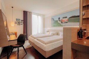 Hypo-allergenic bedding, in-room safe, desk, laptop workspace