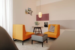 Studio, City View | Living area | Flat-screen TV