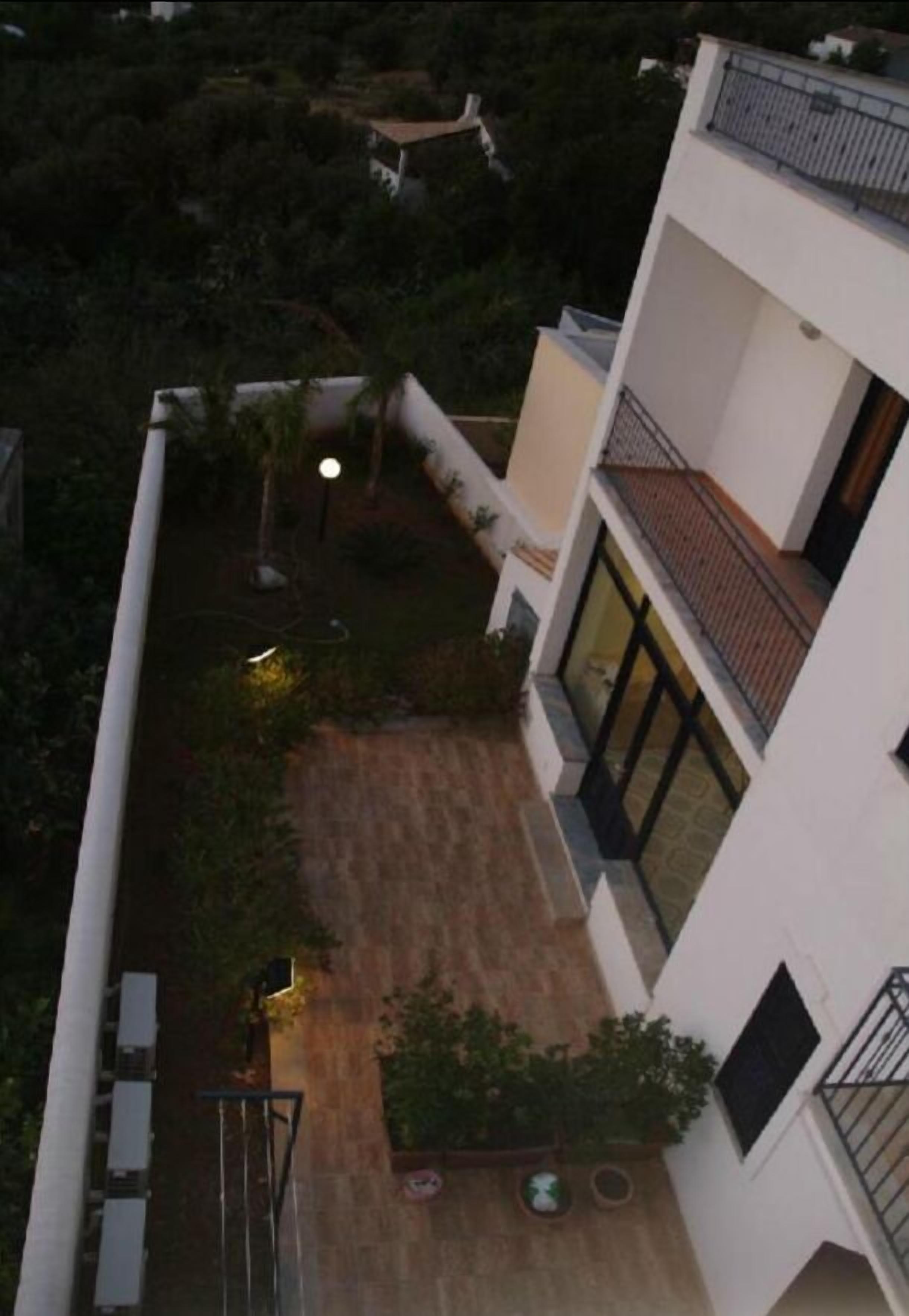 A multi-story building with a courtyard.