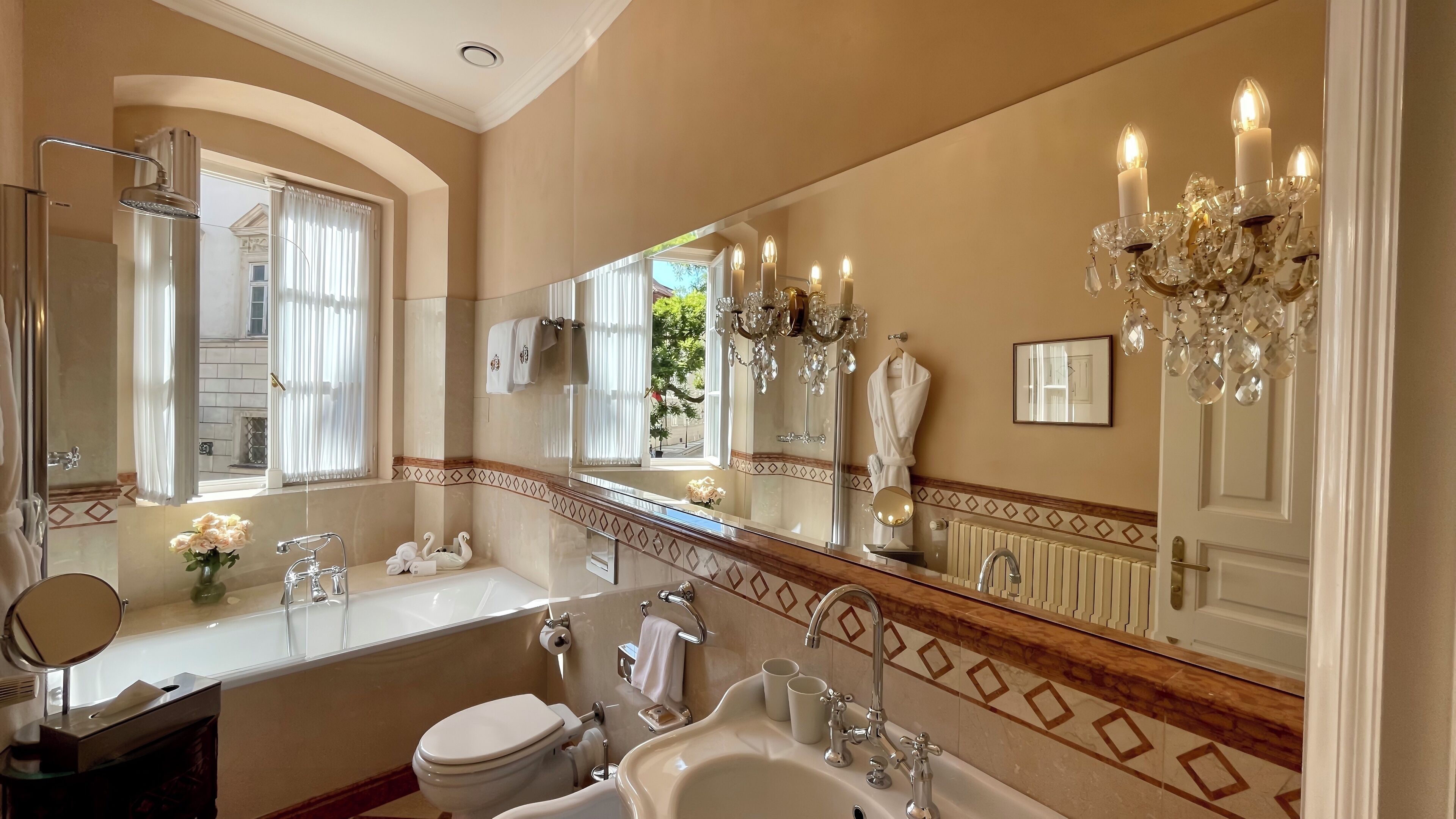 two bedrooms suite with balcony | bathroom | rainfall showerhead, designer toiletries, hair dryer, bathrobes