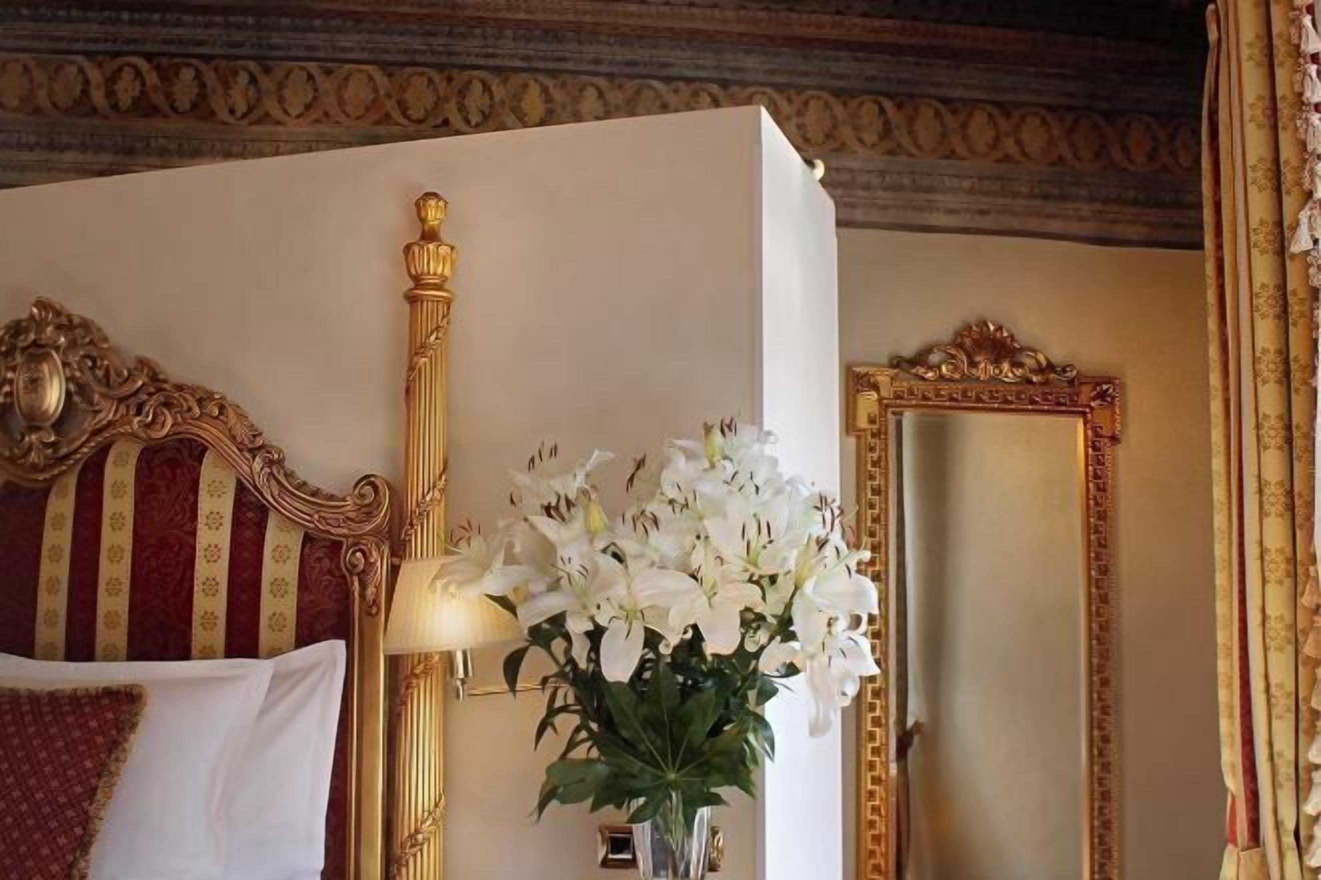 Hypo-allergenic bedding, down comforters, minibar, in-room safe