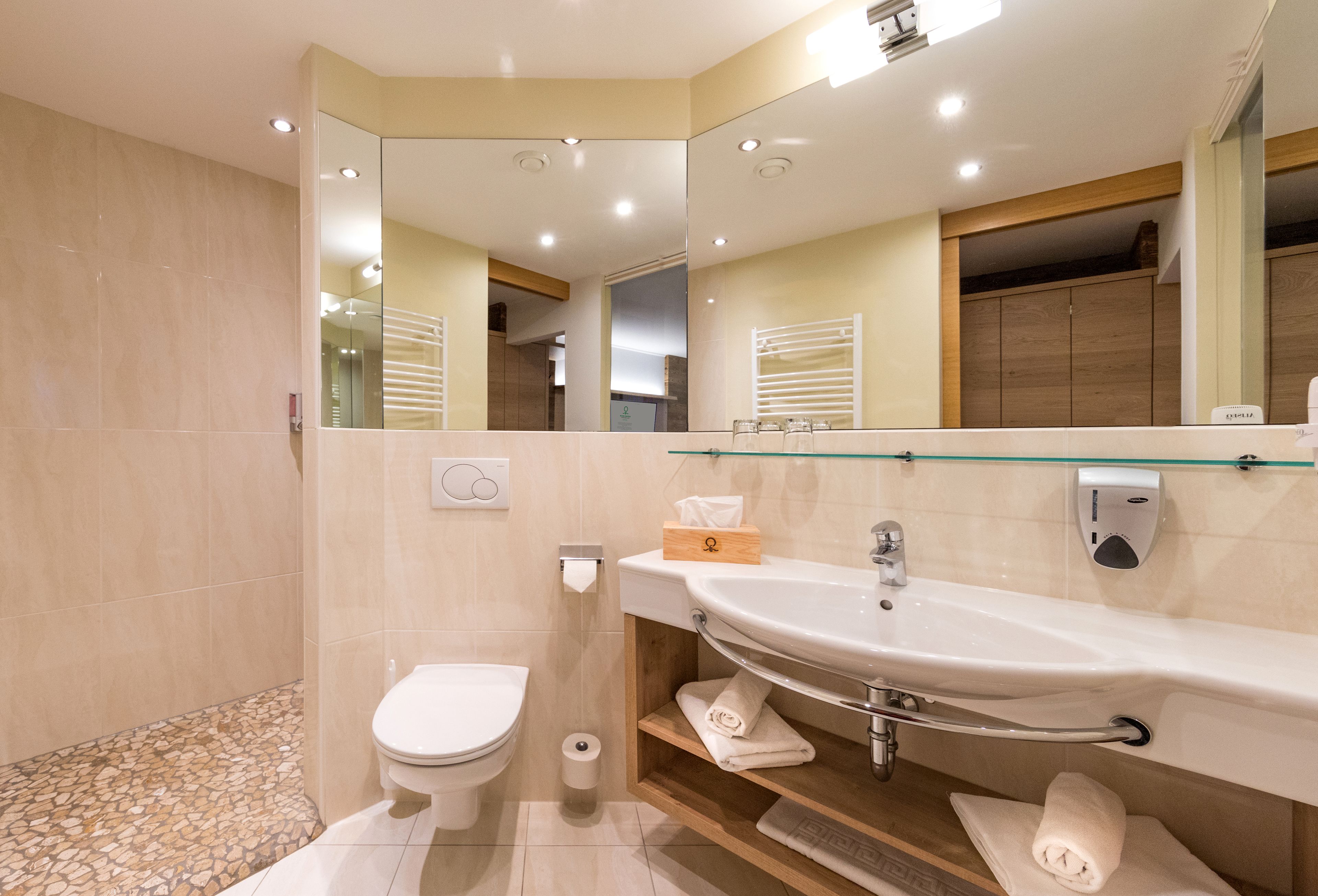 superior double room | bathroom | hair dryer, towels, soap, shampoo