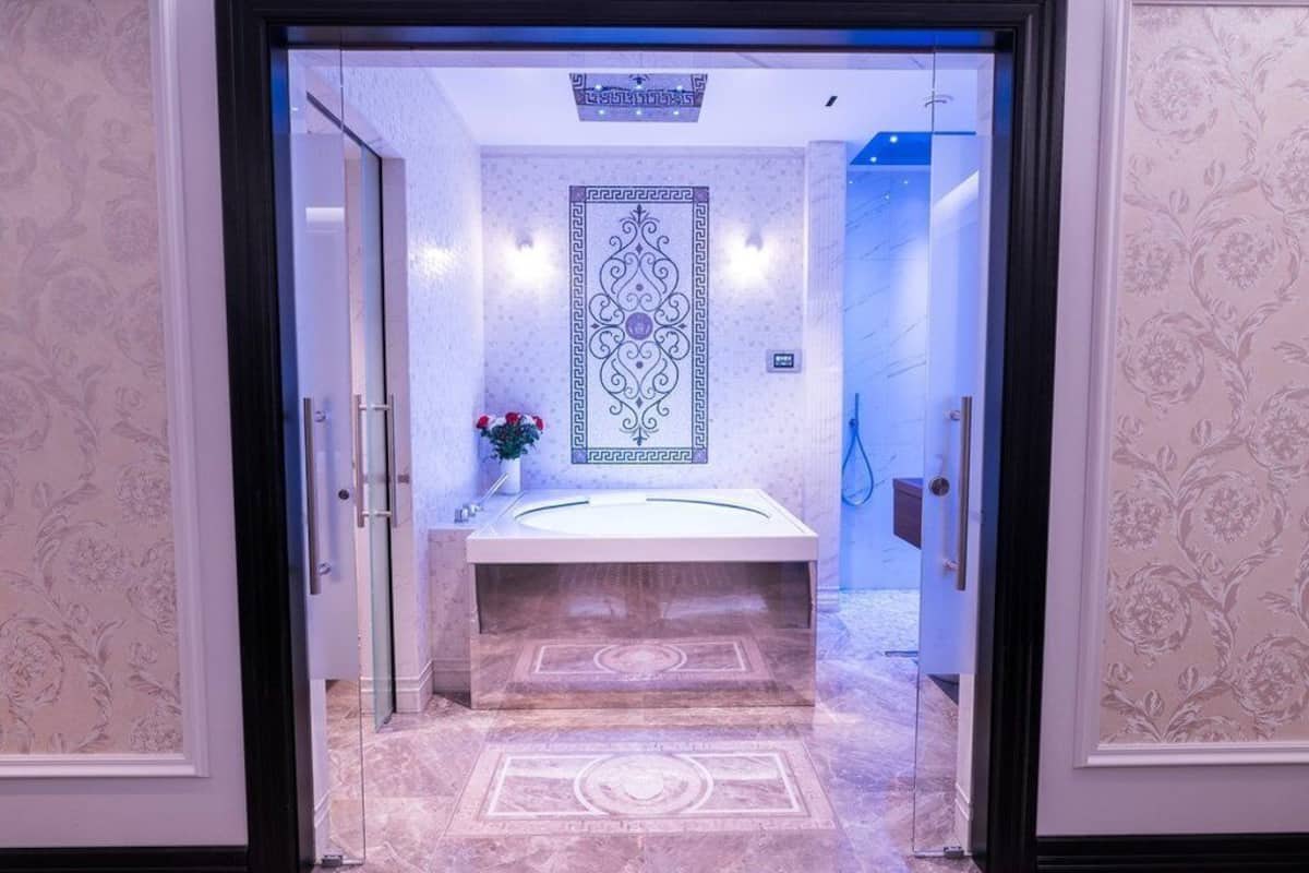 ruby suite - free spa access | bathroom | free toiletries, hair dryer, bathrobes, slippers