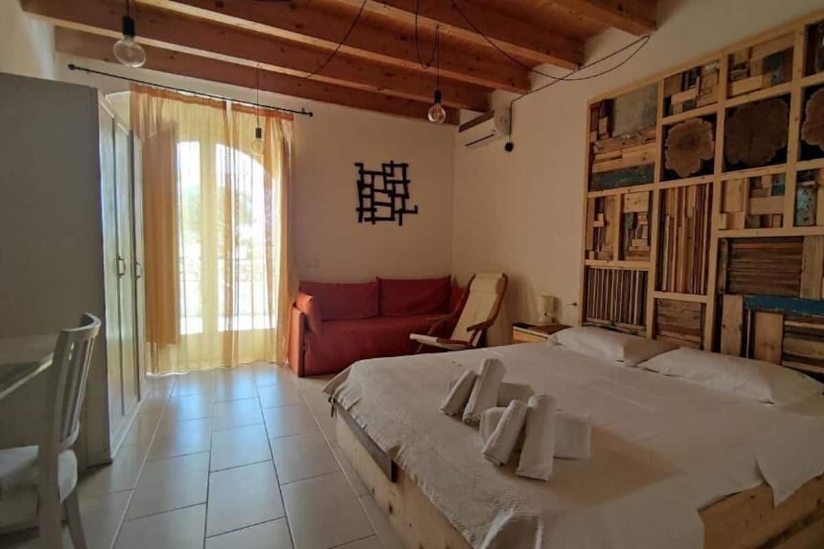 Deluxe Double Room, 1 Double Bed with Sofa bed, Patio, Courtyard View | Premium bedding, desk, laptop workspace, soundproofing