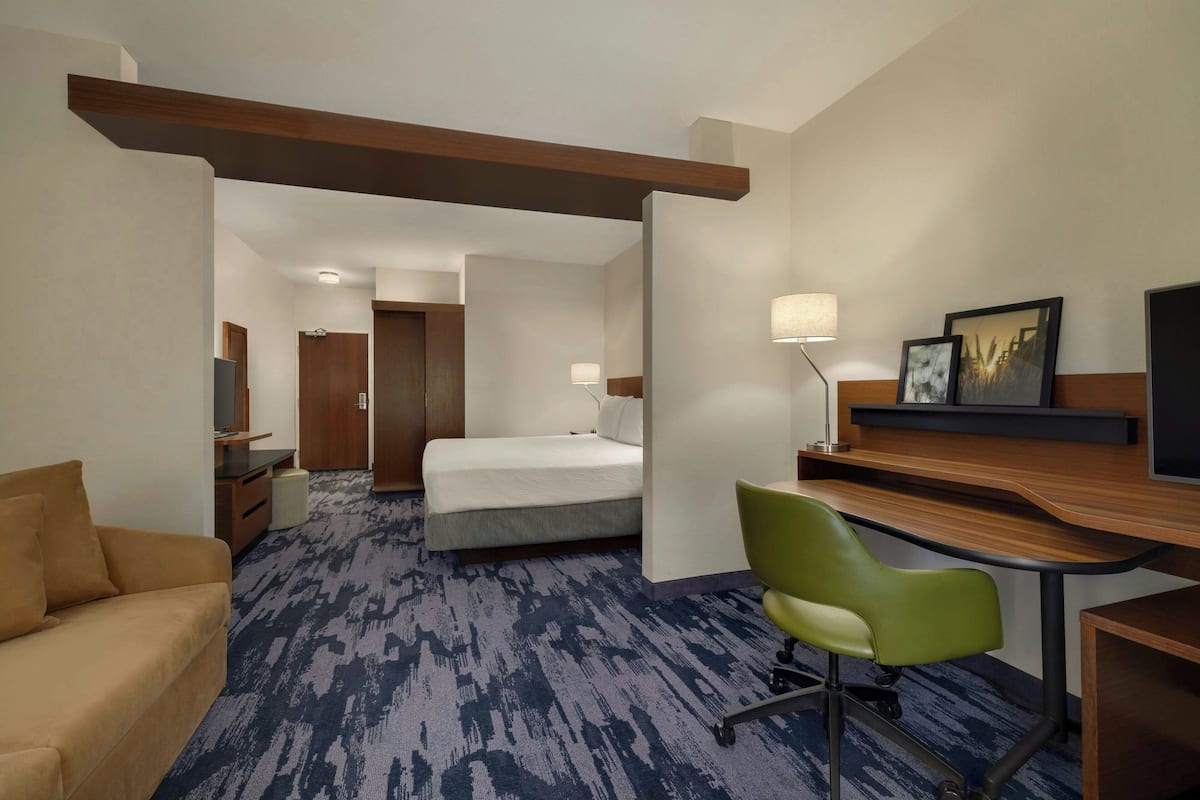 Suite, 1 King Bed with Sofa bed | Desk, iron/ironing board, high-speed internet, alarm clocks