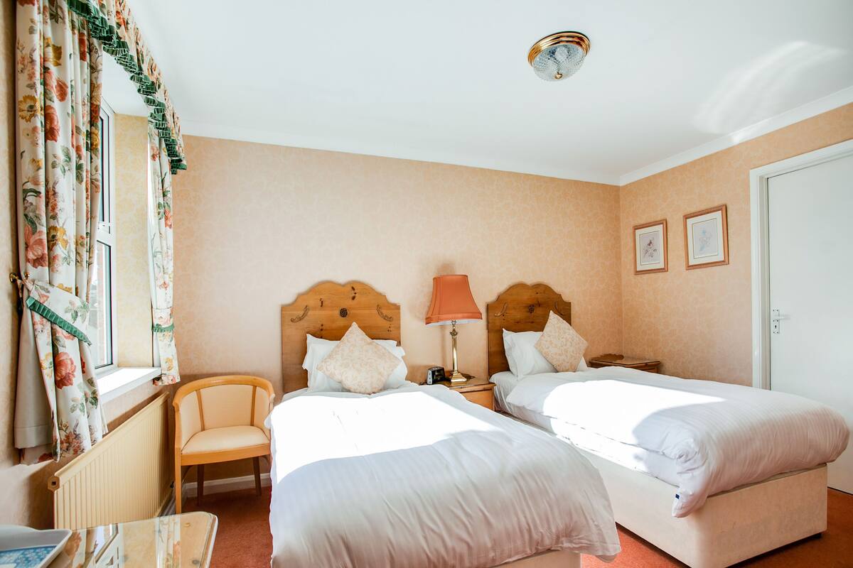 Desk, iron/ironing board (on request), WiFi (free), bed sheets