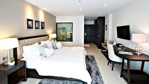 Cabana Room | Minibar, in-room safe, desk, soundproofing - SN Plus Hotel - SHA Plus (Pattaya)