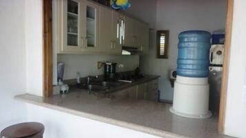 Fridge, microwave, stovetop, coffee/tea maker