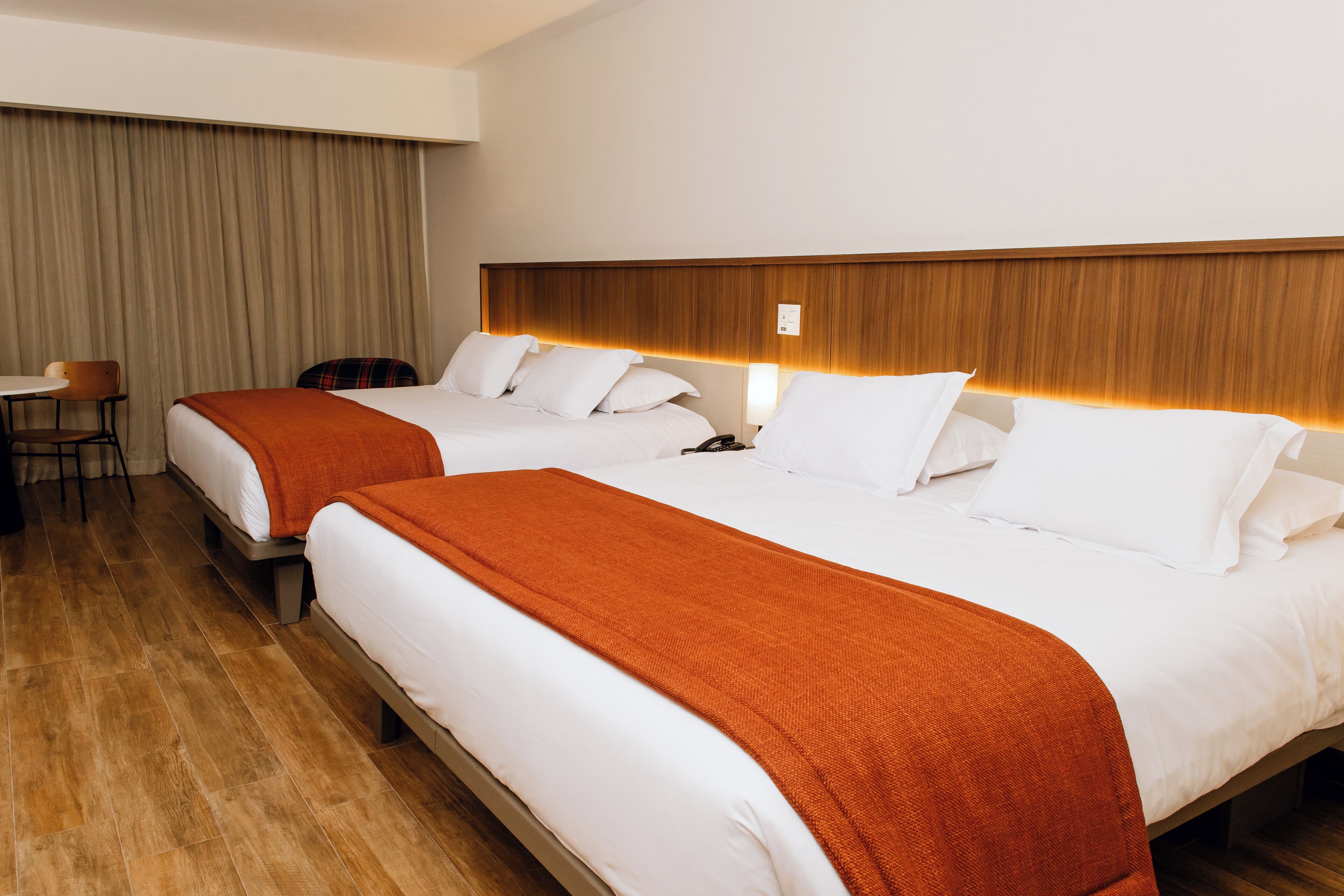 Deluxe Quadruple Room, Resort View | In-room safe, desk, laptop workspace, blackout drapes