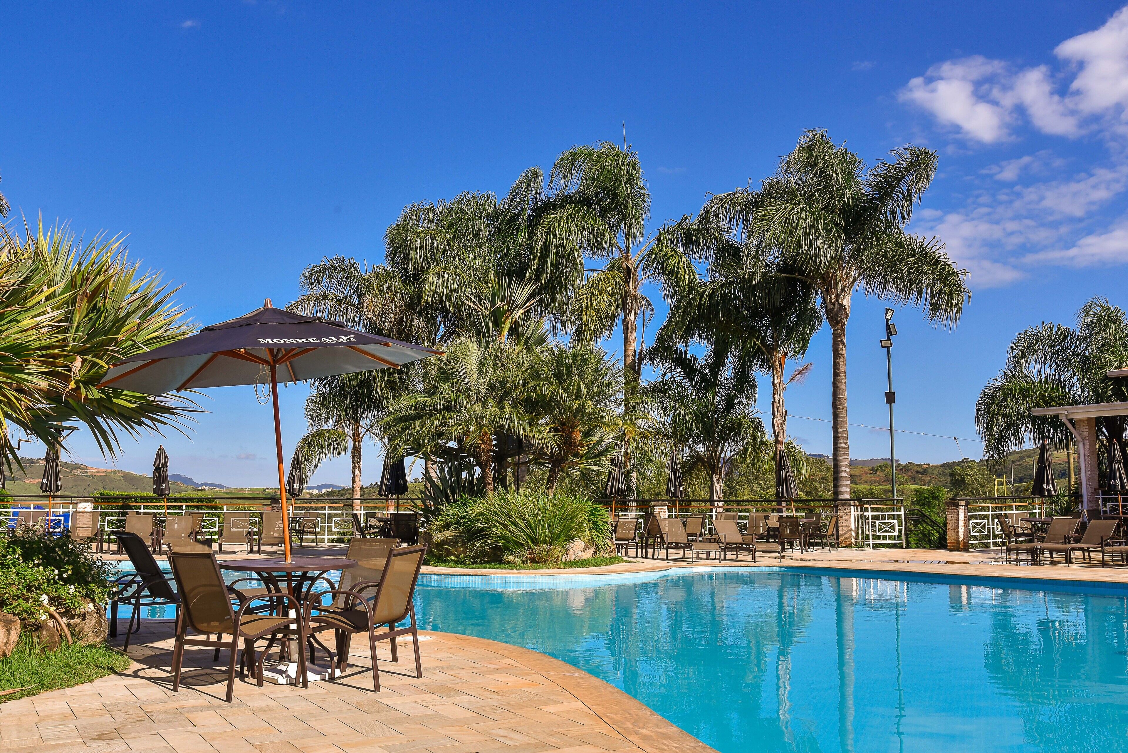 4 indoor pools, 7 outdoor pools, open 9:00 am to 7:00 pm, pool umbrellas