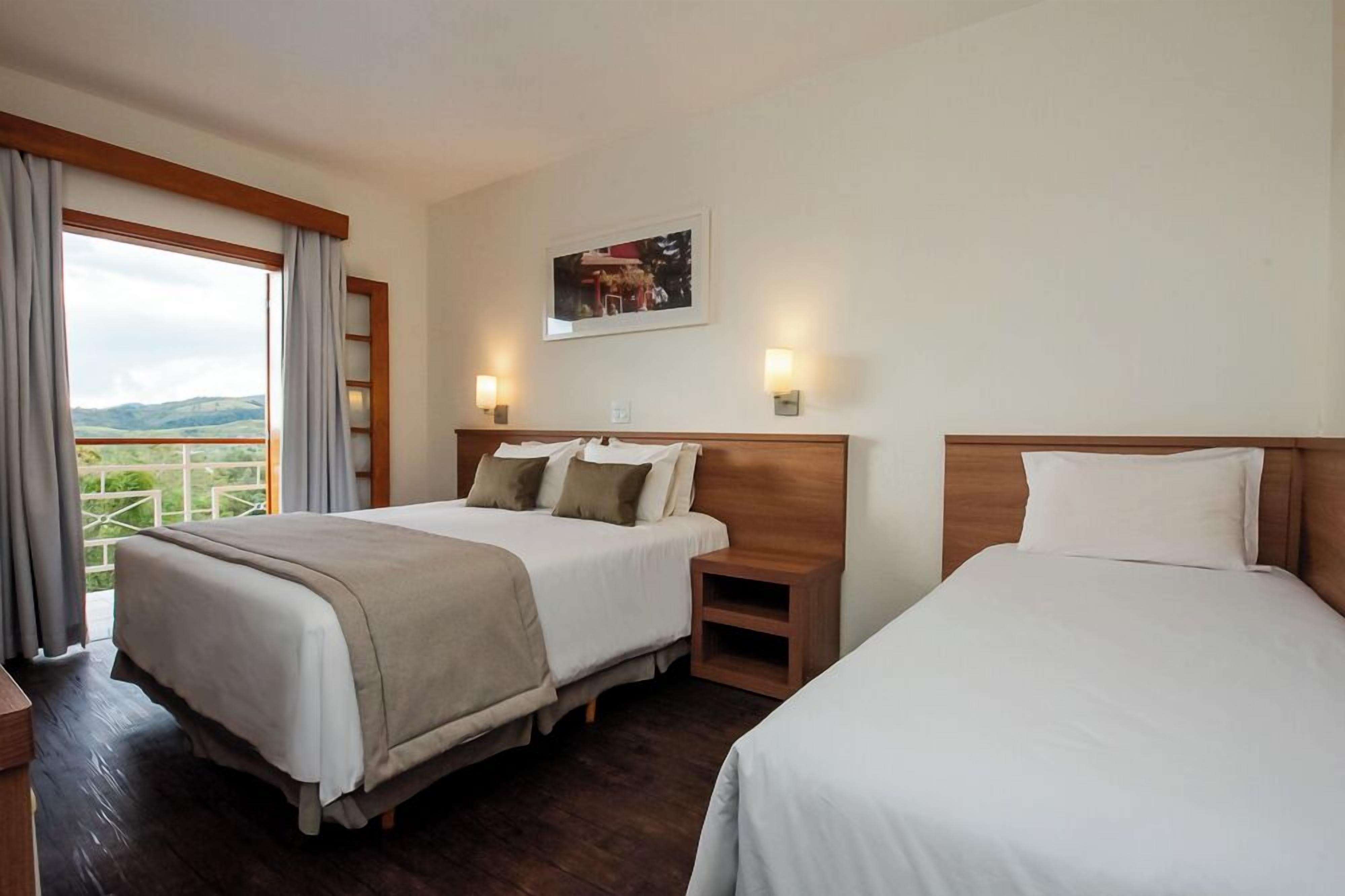 deluxe twin room | in-room safe, desk, blackout curtains, soundproofing