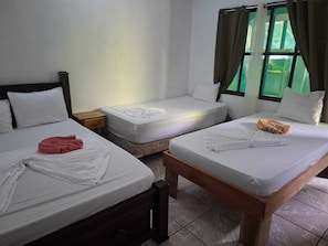Economy Quadruple Room, 1 Bedroom | Free WiFi, bed sheets