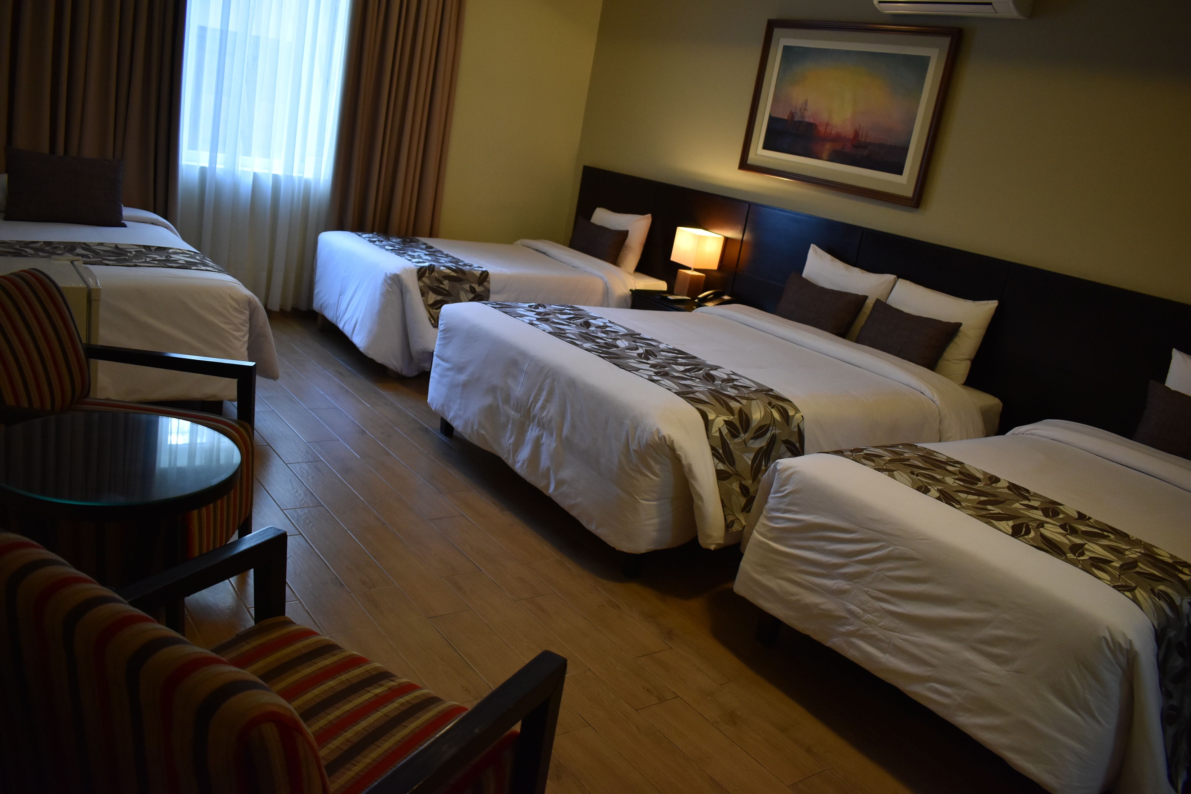 family room | 1 bedroom, down duvets, in-room safe, individually decorated