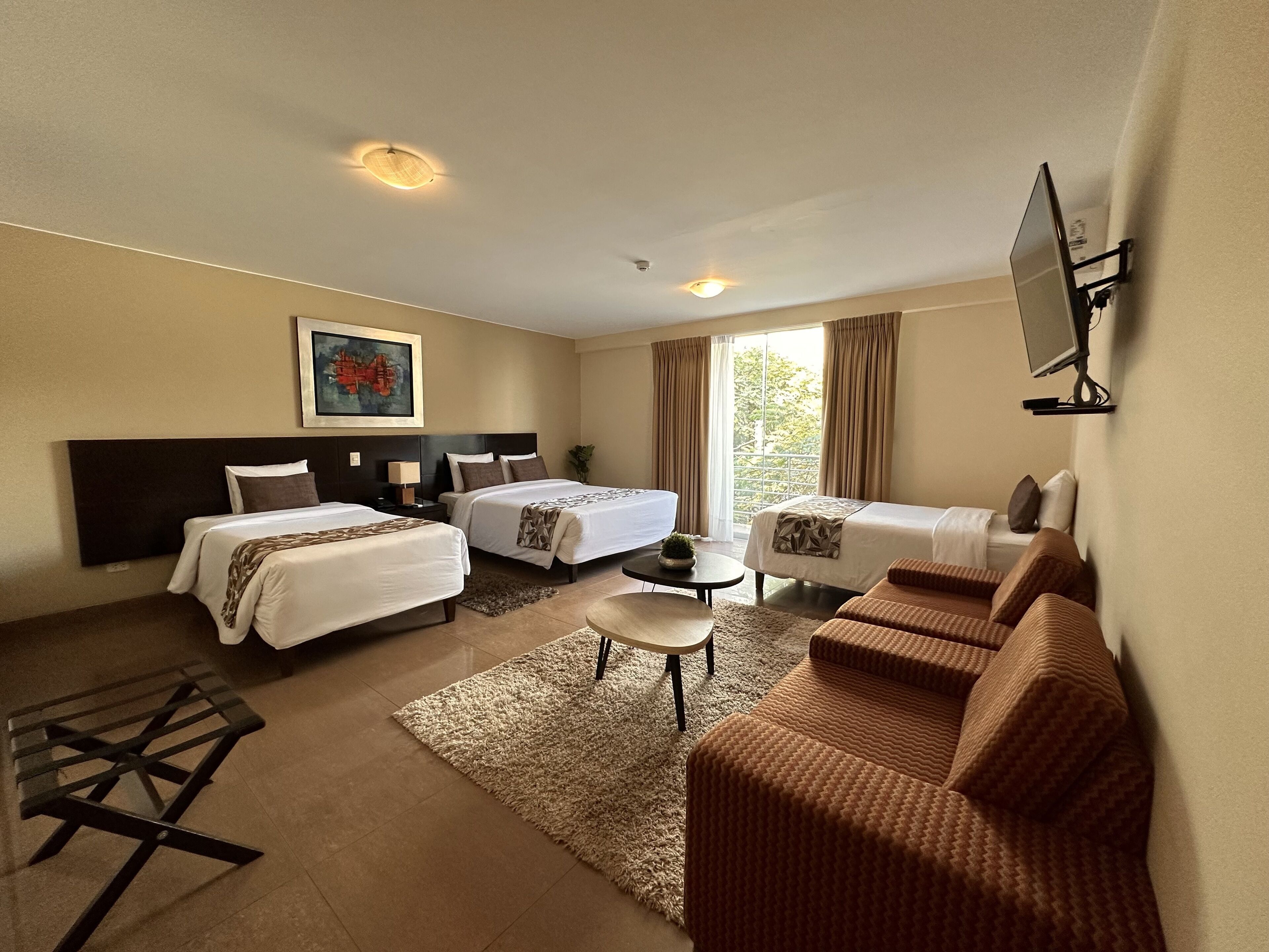 family room | 1 bedroom, down duvets, in-room safe, individually decorated