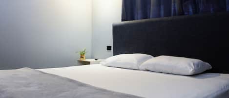 Premium bedding, down duvets, desk, blackout curtains